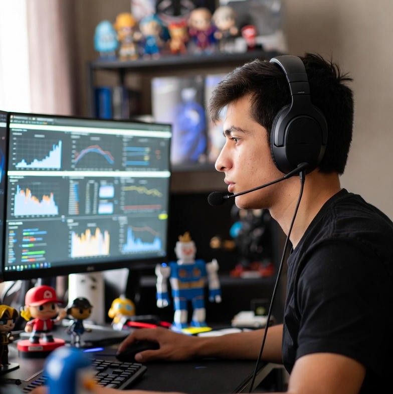 gamer analyzing charts beside in-game items